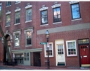 [street number] West Cedar St, [town_name], [state_name]