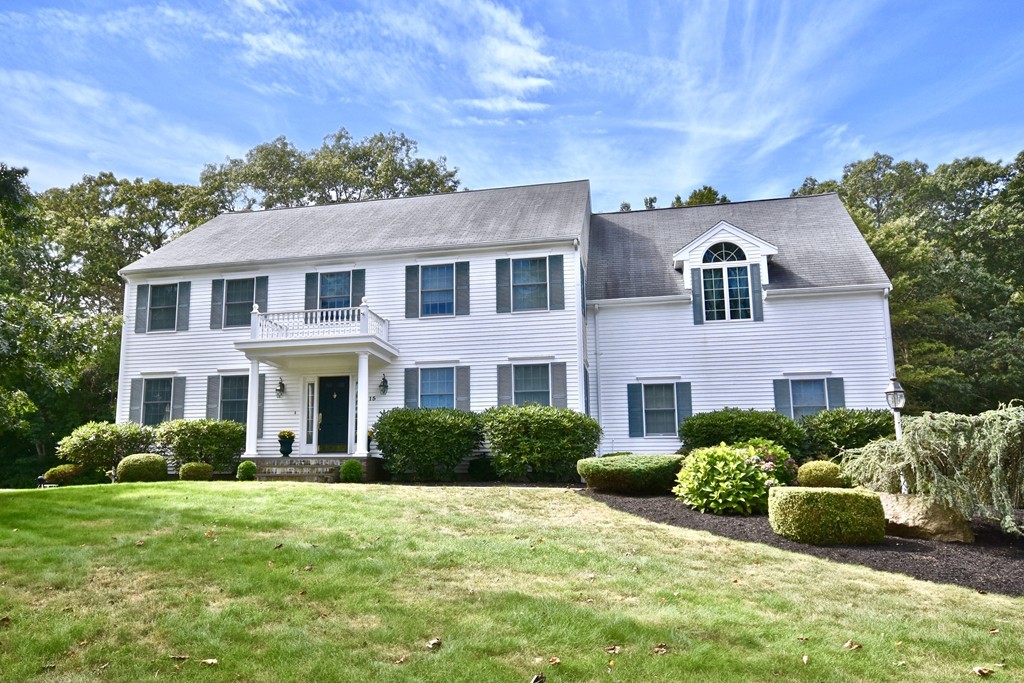 Stately Colonial-style home in South Dartmouth, located in the coastal community of Sunrise Cove. Enter this classic colonial via a spacious foyer.  Large eat-in Kitchen with granite counter tops, breakfast bar that seats 4, hardwood floors and French sliders that open up to a large deck. The dining room adjacent to the kitchen with chair rails and hardwood floors, great for entertaining. Second level offers master suite with walk-in closet and bath. There are three additional  bedrooms and one full bath. The spacious great room with cathedral ceilings is such a bonus to this home, with endless possibilities.  Hardwood floors are present through out this house. Private fenced in back yard with perennials and rose beds. Located in walking distance to Padanaram Village/Harbor, home of the New Bedford Yacht Club.