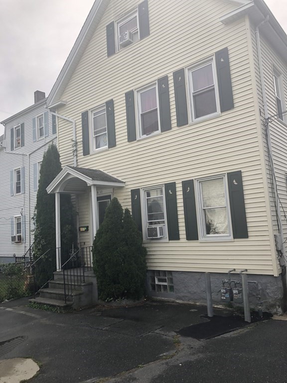 Two family home with 2nd and 3rd floor cottage setup.  Home fully rented.  All appliances to pass with sale of home.  Roof redone in 2017.  Property is set back from the street. May be also be purchased as a package with front house which is a 3-family. see MLS # 72900900