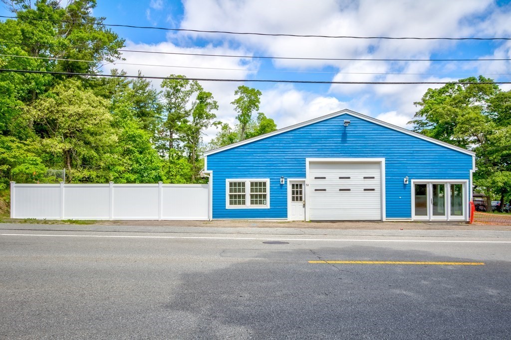 Beautifully renovated, very visible commercial building with high traffic count on Route 6. Ease of entry to the central service area through an oversized 10' x 12' bay door with a second bay door in the back for drive through to rear Lot. The front office is light and bright with recessed lighting, multiple glass doors and windows, beautiful shiplap pine and raised reception desk. The ground level also includes a large utility / storage room and split bath with separate shower. On the second floor is a private bonus room overlooking the back yard. The Seller is in the process of tying in to public sewerage. The lot is .54 acres and fully fenced with newly installed, coated chain link fencing and a tall vinyl privacy fence in front. Archituctural grade roof and large built in exhaust fan. The building has just been painted inside and out and is ready for your business: auto, landscaping, retail, medical, daycare, agricultural, construction, storage and more.