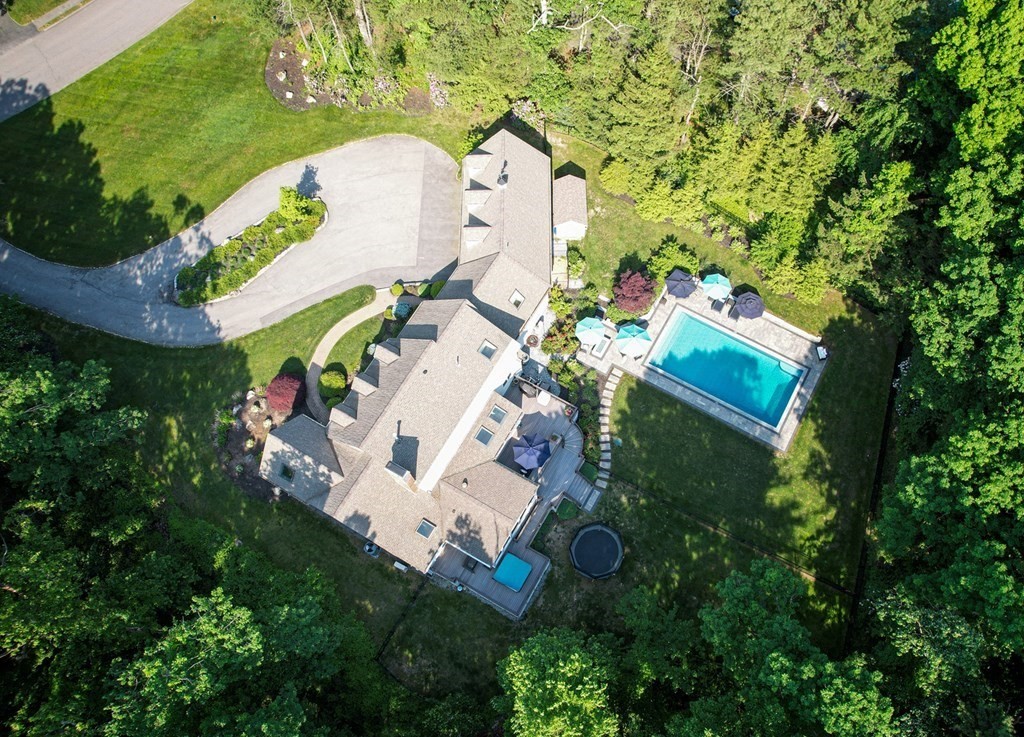 Quintessential sprawling 5BR Cape on one of the most beautiful and private settings in desirable Presidential Estates. Like-new interior & magical resort-like back yard oasis w/amazing pool, fire-pit, hot tub, maintenance-free deck & shed. Over $400K in recent updates incl. pool & back yard, baths & kitchen w/refinished hardwood floors, cabinets, backsplash, coffee station & Thermador double ovens. Sub-zero frig, Wolf gas cooktop, Bosch D/W, beverage frig, breakfast island & expanded dining area w/skylights & built-ins. Family Rm w/marble surround fireplace, columns, bead-board ceiling & built-ins. Fabulous Sunroom addition w/beadboard, cathedral ceiling overlooking lush professionally landscaped yard. 1st fl cath. Master w/fireplace, palladium window & bath w/steamshower. 1st fl. office w/vaulted ceiling, skylight, bay window w/window seat, 2nd Office potential/Bonus Rm & add'tl workspaces. 2 staircases, Fin Bsmt w/Gym,Game Rm & Bonus Rm. Near St Marks, Fay & Southboro's top schools!
