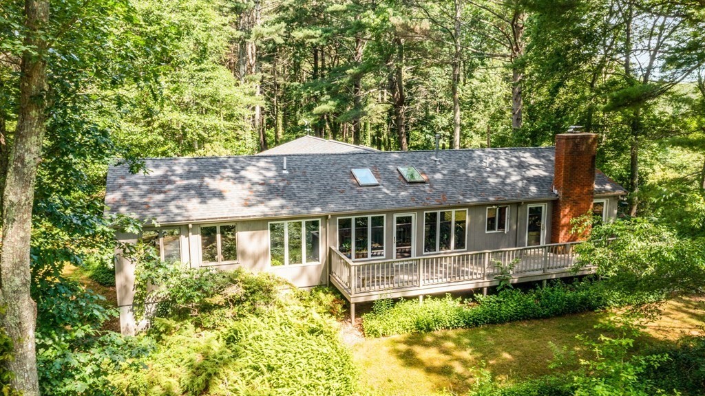 A nature-lover's dream!  You won't find a property like this on the market very often!!!  This home is nestled on a serene ~12 acre lot with around 900 feet of waterfrontage on the Nemasket River. So much wildlife, flora and fauna to enjoy with access to canoe or kayak whenever you wish.  This unique home was redone by current owner into a wonderful and unique retreat all on one level.  Main bedroom offers the views of the river-side with its own ensuite bath & two exterior access doors & fireplace. Main living area is open & bright with cathedral ceilings, cozy reading nook & deck access.  Kitchen and dining area compete this open floor plan area.  Covered porch with stove offers an additional living space to retreat to.  This home offers hardwood floors, attached two-car garage, full walkout basement which could be finished in the future, separate laundry room and new roof (2019).  You are surrounded by nature yet close to highways and commuter rail.  A rare find!!