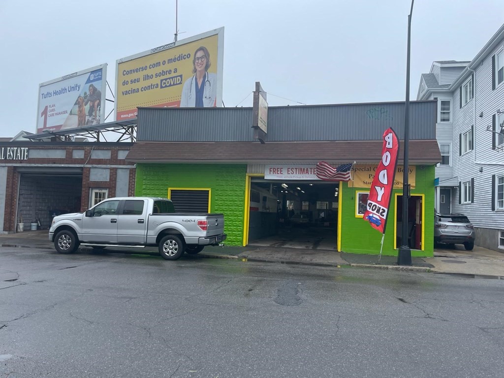 Zoned MUB business.  3,471 sf building, auto body / auto sales, building and corner car lot. Building has 12.8 foot ceilings, office, painting booth, one lift and one frame machine. Property has been well kept, has good visibility and high traffic.  Additional parking in rear/side. Corner lot has frontage on Dartmouth St. and frontage on Hollyhock St.  Additional corner car lot in the rear and side lot, to be sold together. (0 Dartmouth Street, New Bedford)