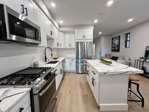 169 Maverick St, Apt 1